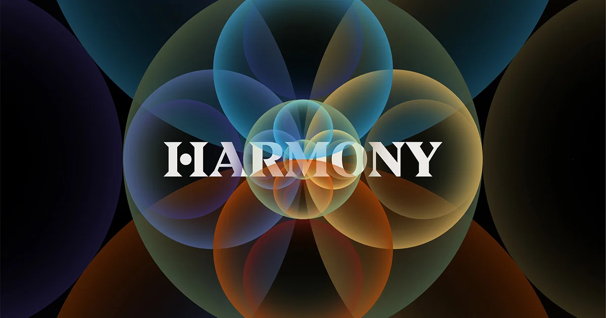 HARMONY wordmark over overlapping translucent circles in blue, green, orange and gold on a black background